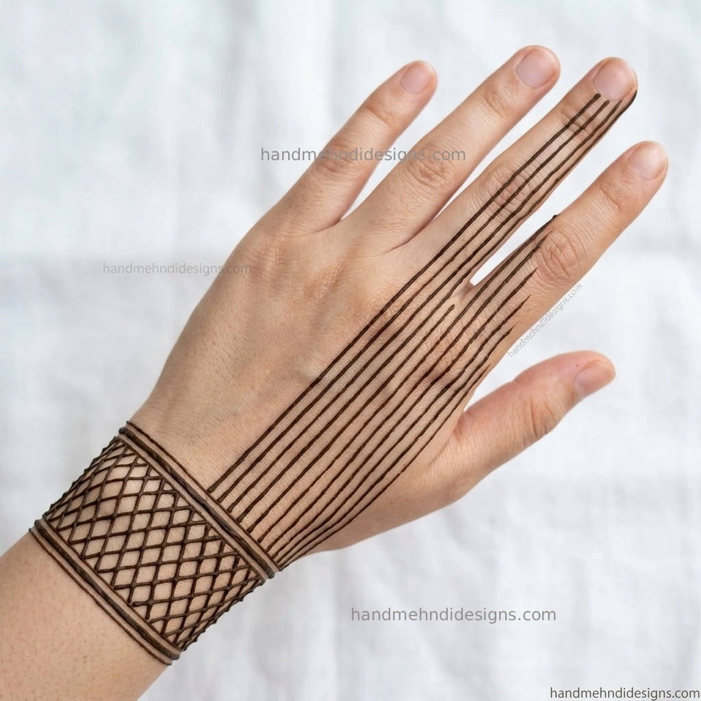 Fine line geometric back hand mehndi pattern with diamond wrist cuff