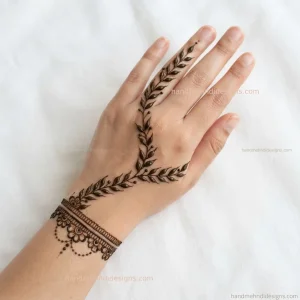Leaf vine mehndi extending from a slim wrist bracelet into the lower palm